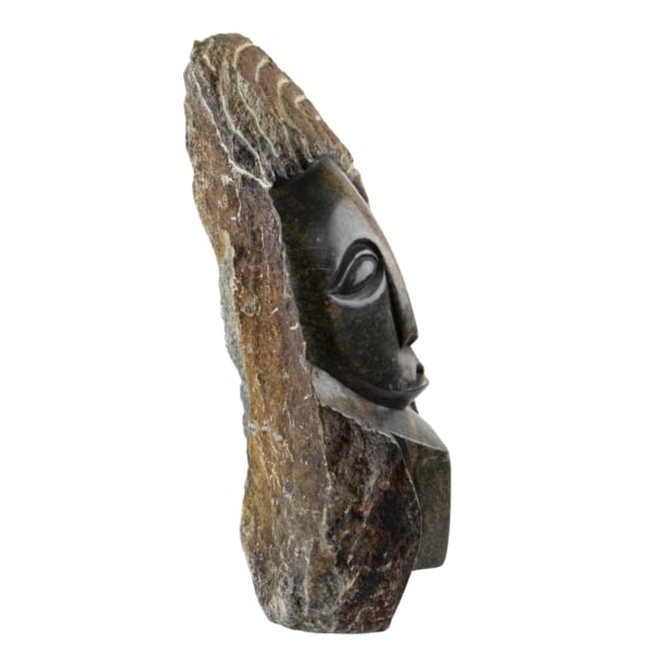 Woman’s Face on Rock